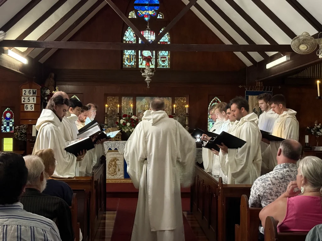 Gregorian Chant Choir at the Altar Choir singing near the altar during Gregorian chant at The Abbey Church